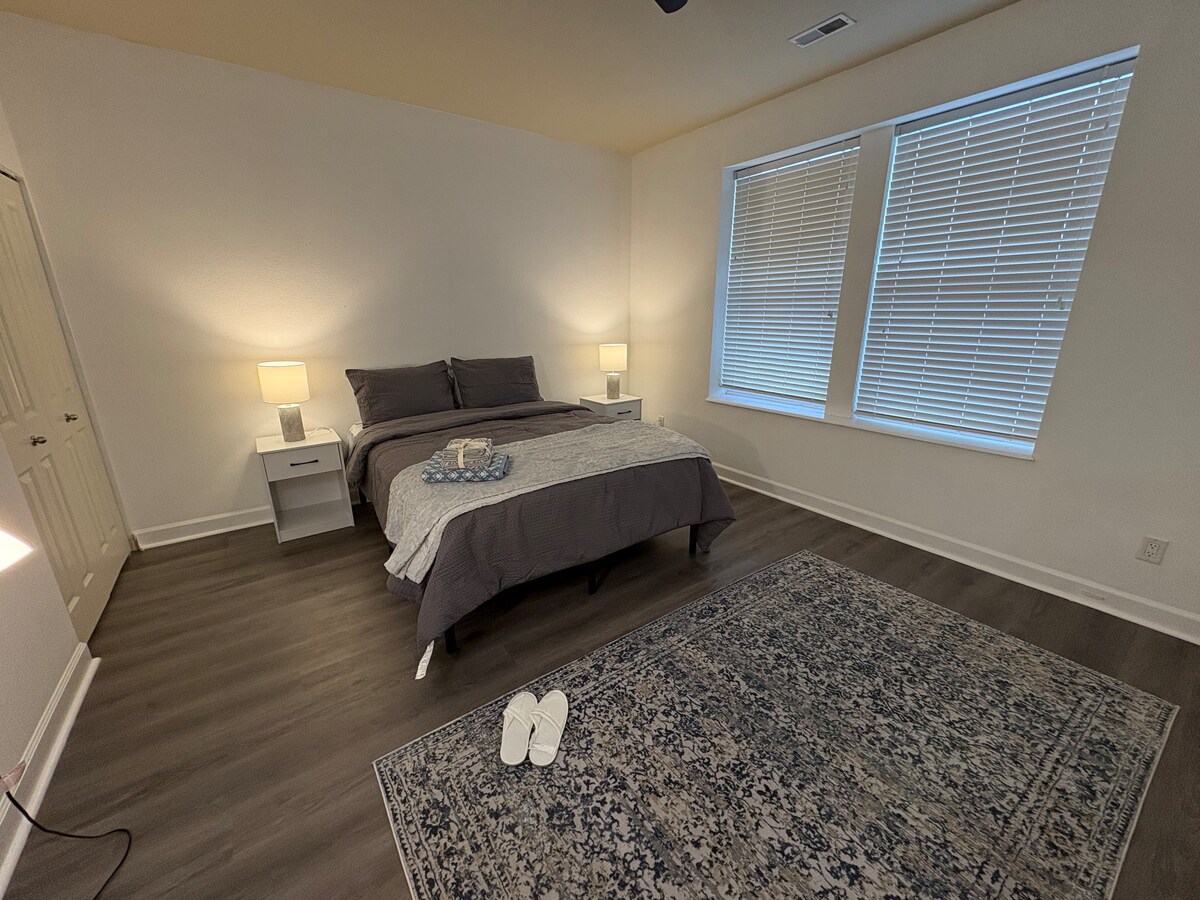 Primary bedroom with queen bed
